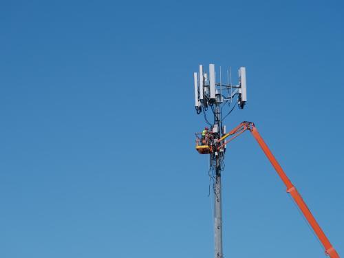 Maintenance on a mobile phone tower - Australian Stock Image