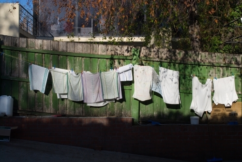 Makeshift clotheslines behind a cafe - Australian Stock Image