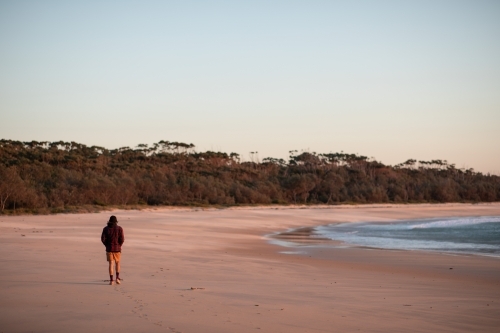 Man Alone Walking Beach - Australian Stock Image