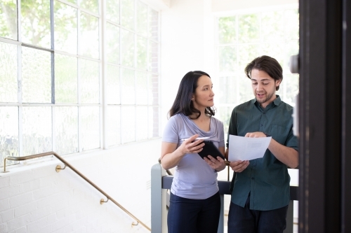 Man and woman in discussion - Australian Stock Image