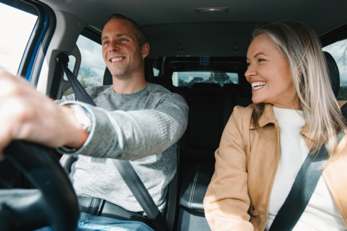 Man and woman travelling in a car together - Australian Stock Image