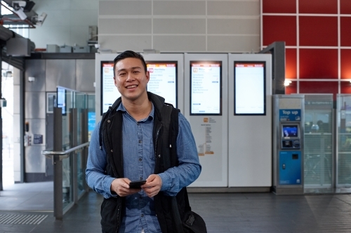 Man at train station - Australian Stock Image