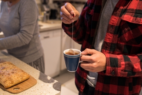Man making a cup of tea - Australian Stock Image