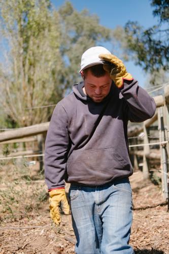 Man taking a Break from Work on Farm - Australian Stock Image