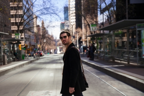 Man walking to Work on a Melbourne Winter Morning - Australian Stock Image
