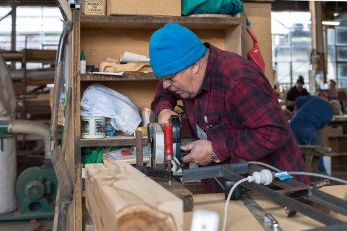 Man working at a Men's shed - Australian Stock Image