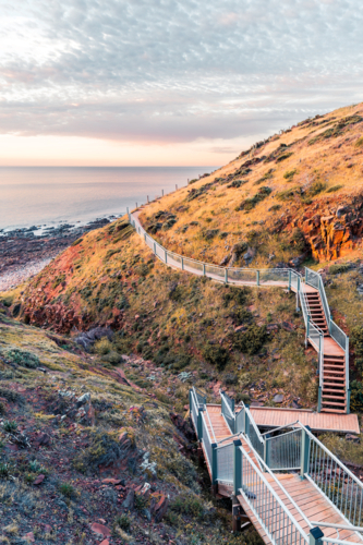 Marion to Hallett Cove Coastal Walking Trail with sea view at sunset, South Australia - Australian Stock Image