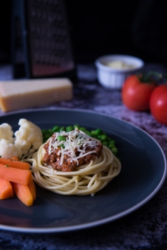 Meal of spaghetti and veggies - Australian Stock Image