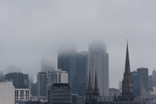 Melbourne city on a grey foggy morning - Australian Stock Image