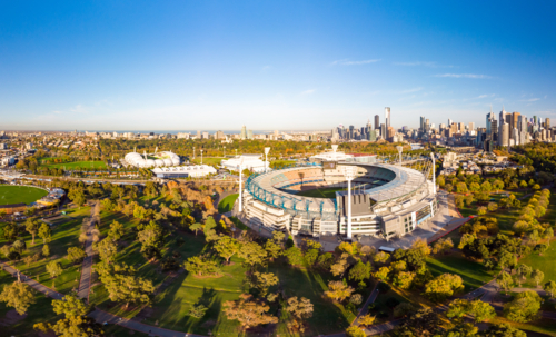 Melbourne's famous skyline with Melbourne Cricket Ground stadium in the foreground. - Australian Stock Image