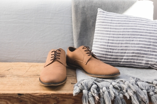 Mens Dress Shoes on Rustic Table - Australian Stock Image