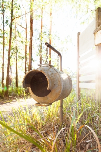 Milk can mailbox at front gate - Australian Stock Image