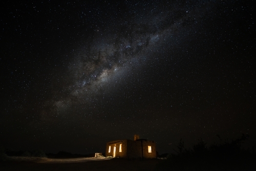 milk way over old stone building - Australian Stock Image