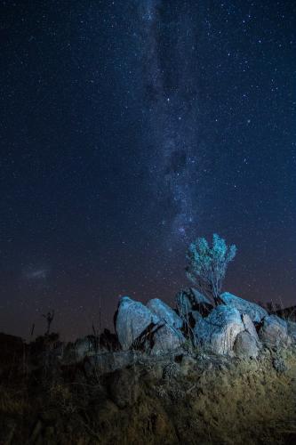 Milky Way Above Rocky Outcrop in the Snowy Mountains - Australian Stock Image