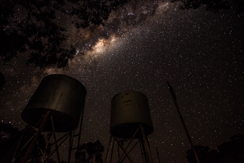 Milky way over fuel tanks - Australian Stock Image
