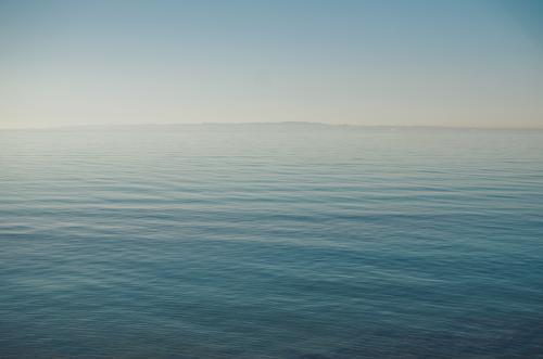 Minimalist ocean, empty blue sea and sky