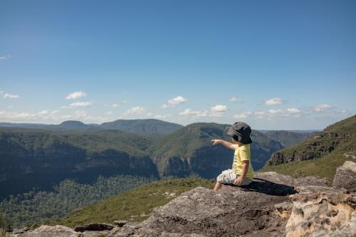 Mixed race boy bush walking in the Blue Mountains - Australian Stock Image