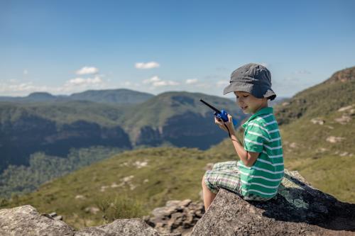 Mixed race boy bush walking in the Blue Mountains - Australian Stock Image
