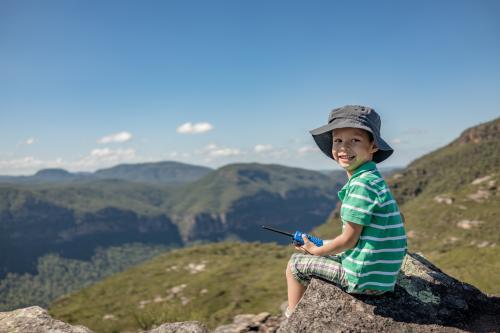 Mixed race boy bush walking in the Blue Mountains - Australian Stock Image