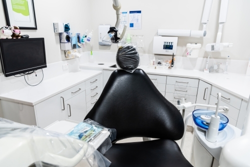 Modern dental treatment room with dental chair