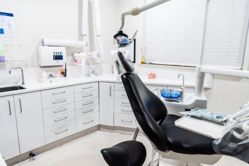 Modern dental treatment room with dental chair
