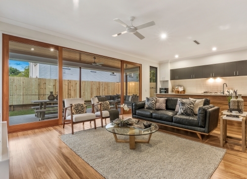 Modern new build double storey house with wooden floor boards and interior decorating - Australian Stock Image