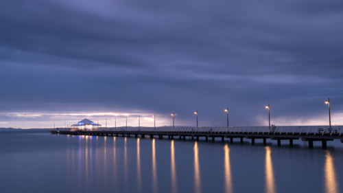 Moody sunrise Shorncliffe Pier - Australian Stock Image