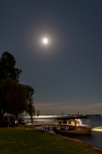 Moon light over lake edge - Australian Stock Image