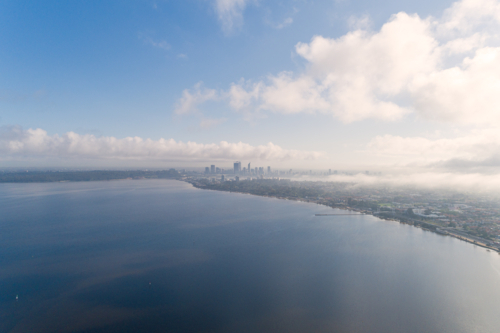 Morning foggy aerial view over the swan river and Perth city - Australian Stock Image