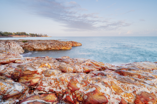 Morning light at Nightcliff Foreshore rocks, Darwin - Australian Stock Image