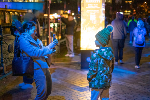 mother and son enjoying the Vivid lights in Sydney - Australian Stock Image