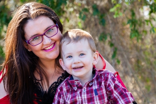 Mother and son smiling together - Australian Stock Image