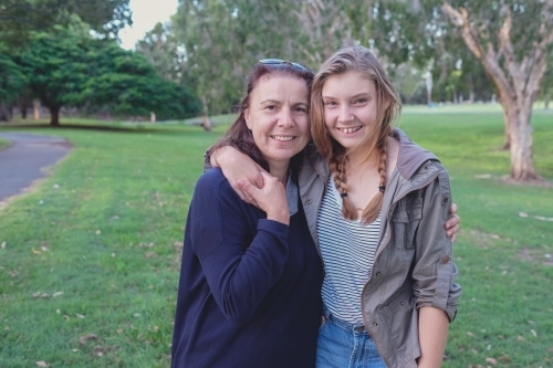 Mother and teen daughter in the park - Australian Stock Image