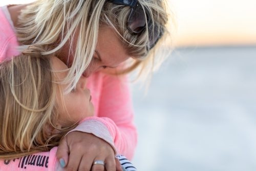 mother comforting child - Australian Stock Image