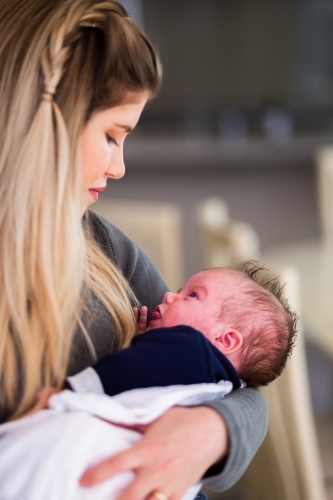 Mother holding newborn baby