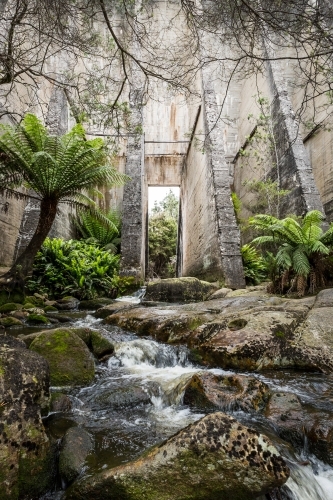 Mount Paris Dam Tasmania disused dam with water flowing - Australian Stock Image