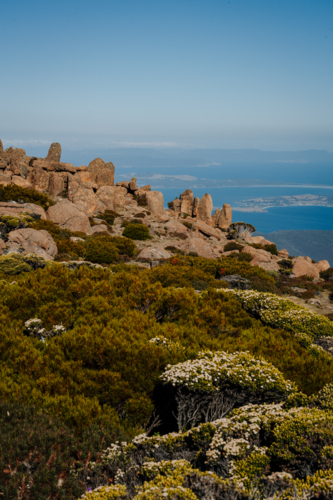 Mountains rugged rock terrain over the coast - Australian Stock Image