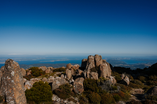 Mountains rugged rock terrain over the coast - Australian Stock Image