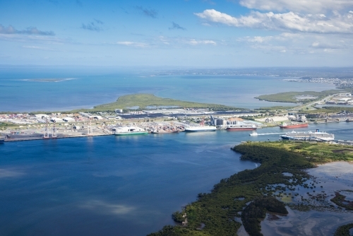 Mouth of the Brisbane River and the Port of Brisbane facility from aerial view - Australian Stock Image