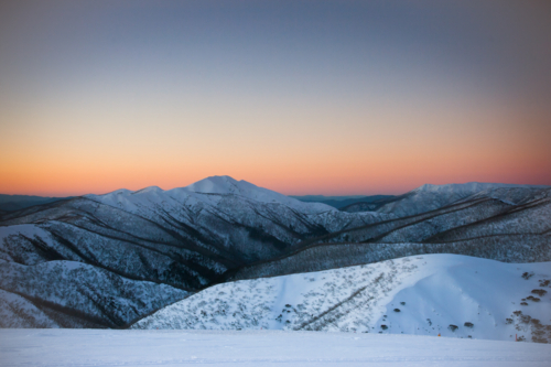 Mt Feathertop and surrounding landscape at sunset during winter near Mt Hotham in Victoria - Australian Stock Image