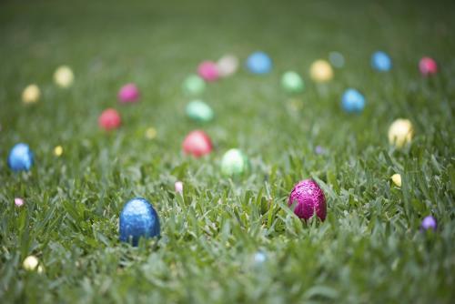 Multicoloured easter eggs in grass