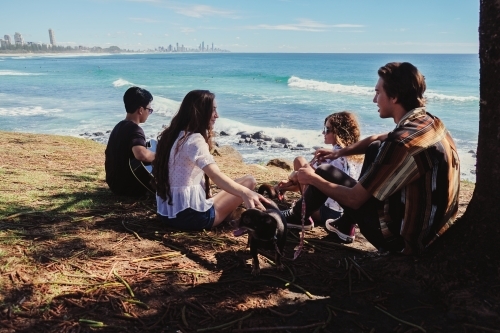 Multicultural teenagers hang out near the beach - Australian Stock Image