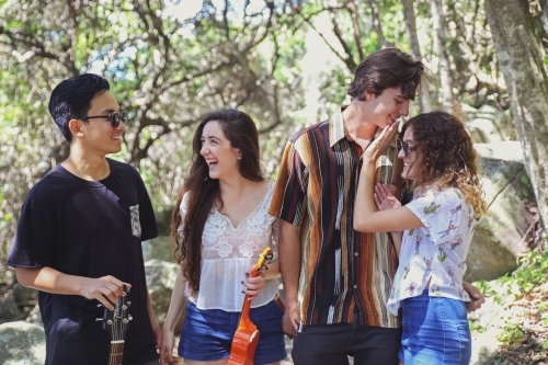 Multicultural teenagers hanging out - Australian Stock Image