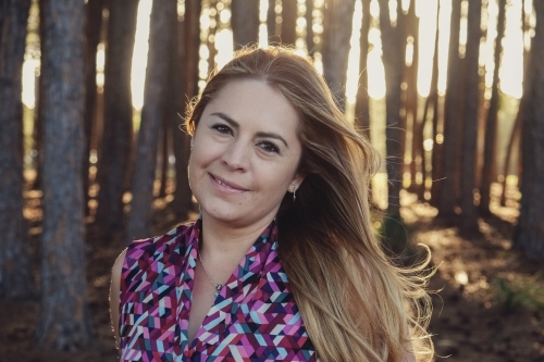 Multicultural woman in the wood - Australian Stock Image