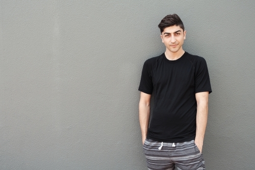 multicultural young adult man, university student - Australian Stock Image