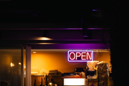 Neon open sign illuminated at take away noodle bar - Australian Stock Image