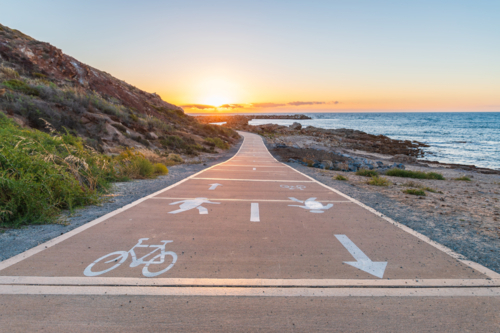 New bicycle lane along the O'Sullivans Beach coast with ocean views - Australian Stock Image