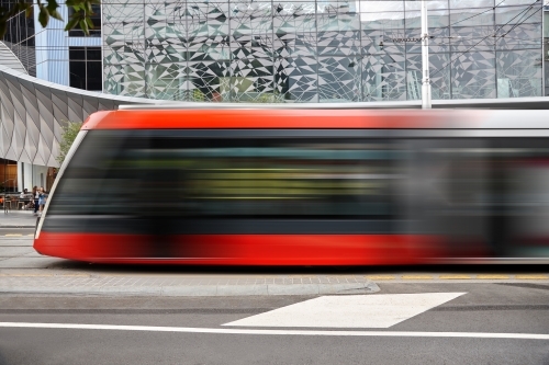 New tram driving in Sydney city - Australian Stock Image