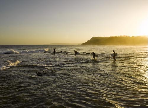 Newcastle Beach surfers - Australian Stock Image