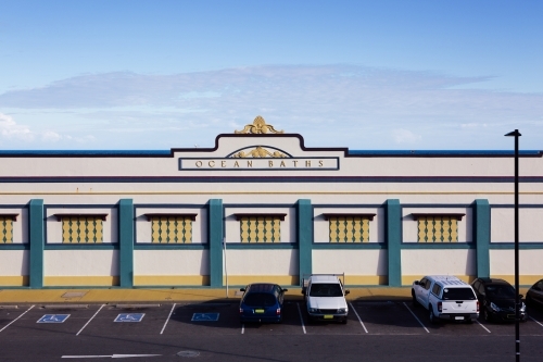 Newcastle Ocean Baths facade at dusk in summer - Australian Stock Image
